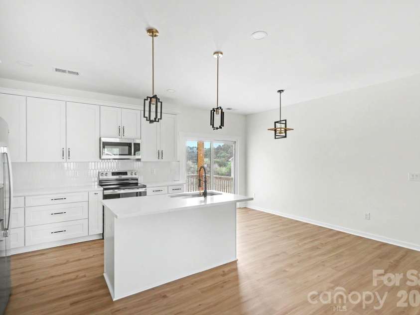 510 Thomas Street, Marshville, NC 28103.  MLS# CAR4373335, YatesRealty ID 31862. Kitchen and Dining area
