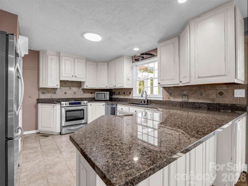52 Forest Road, Asheville, NC 28803.  MLS# CAR4390190, YatesRealty ID 31865. 