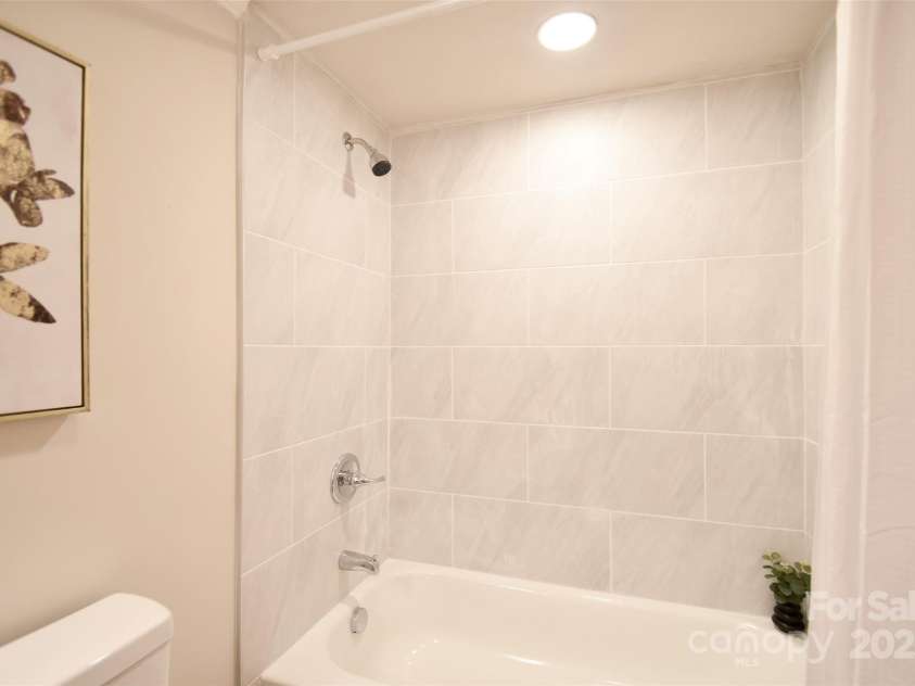 80 Sumner Avenue, Concord, NC 28027.  MLS# CAR4275952, YatesRealty ID 31865. Tile Shower/Bath combination