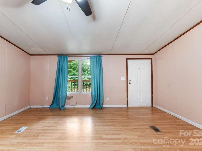 28 Myrtle Road, Swannanoa, NC 28778.  MLS# CAR4289376, YatesRealty ID 31872. Living room
