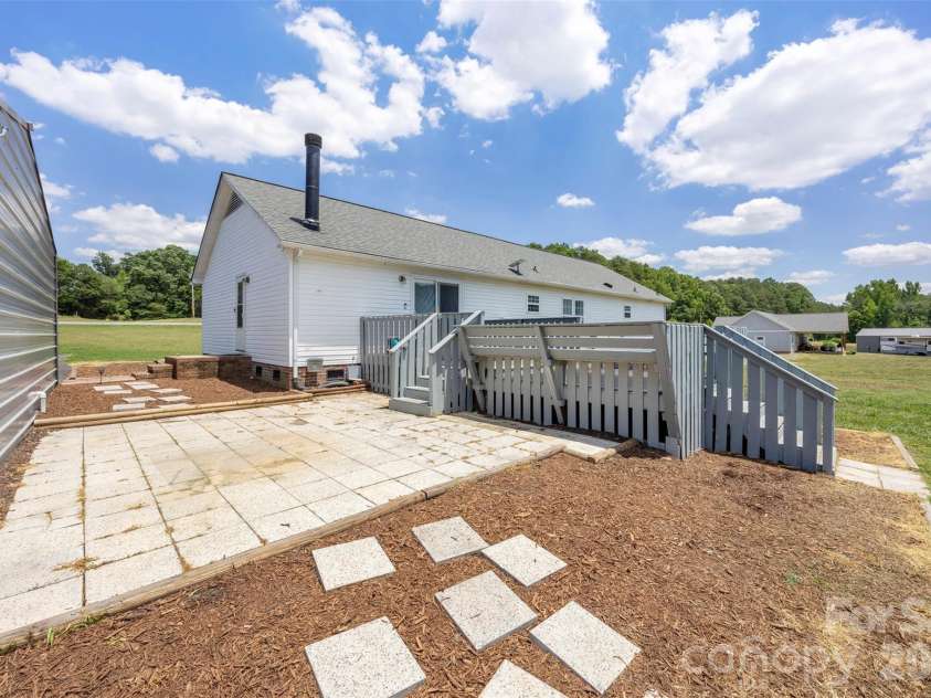 40047 Old Salisbury Road, New London, NC 28127.  MLS# CAR4394424, YatesRealty ID 31873. Back Patio