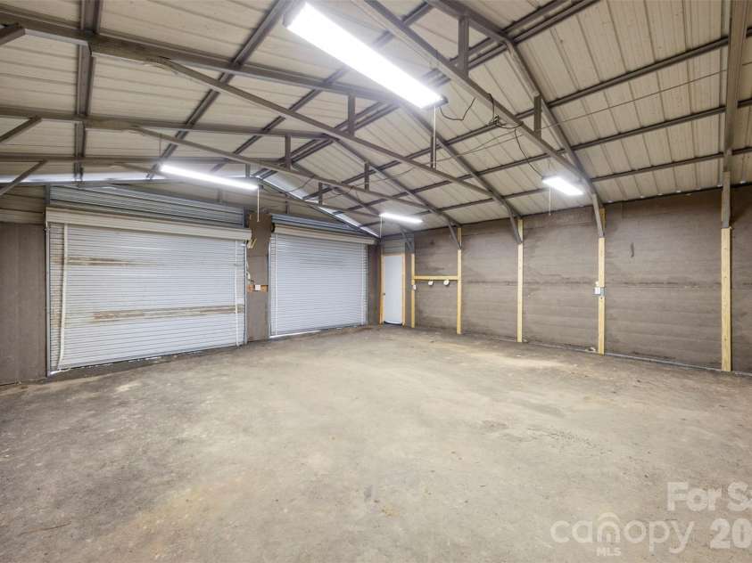 40047 Old Salisbury Road, New London, NC 28127.  MLS# CAR4394424, YatesRealty ID 31873. Inside Garage