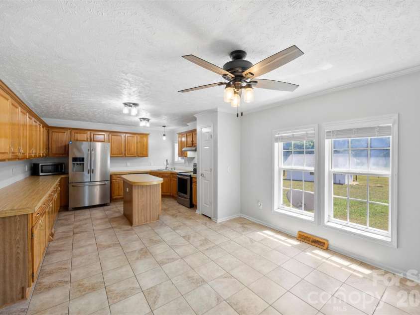40047 Old Salisbury Road, New London, NC 28127.  MLS# CAR4394424, YatesRealty ID 31873. Kitchen and dining
