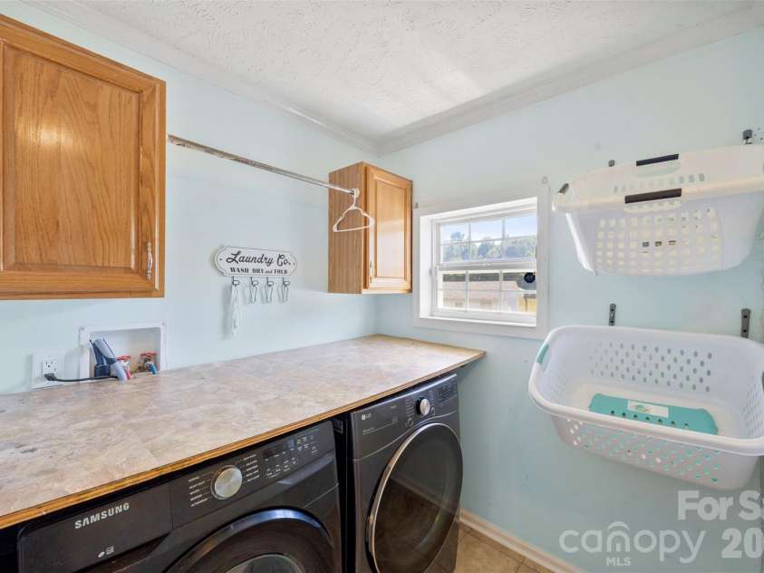 40047 Old Salisbury Road, New London, NC 28127.  MLS# CAR4394424, YatesRealty ID 31873. Laundry Room