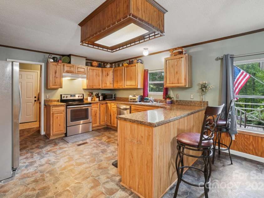 125 Stargazer Lane, Tuckasegee, NC 28783.  MLS# CAR4286319, YatesRealty ID 31876. 