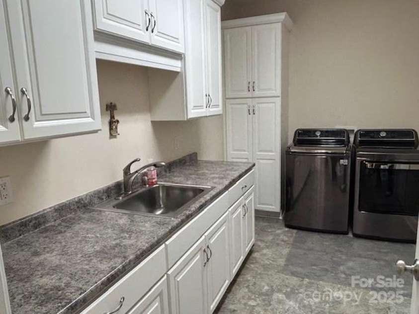 390 Darlington Road, Rutherfordton, NC 28139.  MLS# CAR4282508, YatesRealty ID 31878. Lg. laundry room