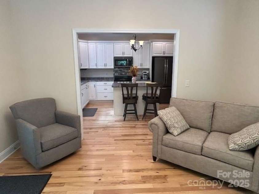 390 Darlington Road, Rutherfordton, NC 28139.  MLS# CAR4282508, YatesRealty ID 31878. Sunroom into kitchen - furniture stays