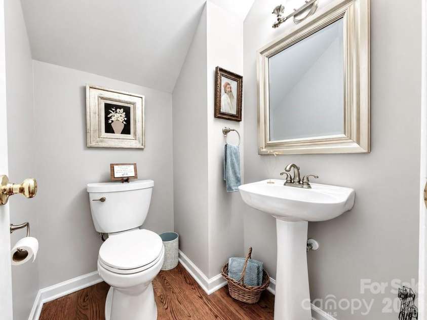 8716 Devonshire Drive, Huntersville, NC 28078.  MLS# CAR4377516, YatesRealty ID 31879. Half bath Main level