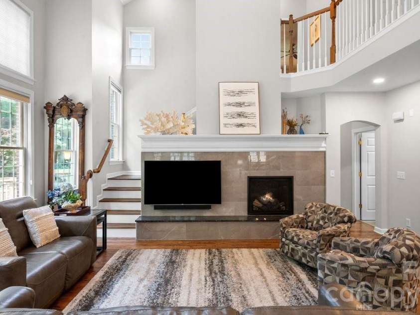 8716 Devonshire Drive, Huntersville, NC 28078.  MLS# CAR4377516, YatesRealty ID 31879. Updated fireplace and TV