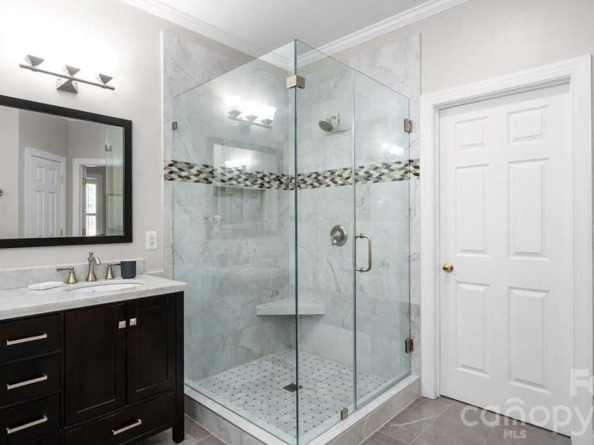 8716 Devonshire Drive, Huntersville, NC 28078.  MLS# CAR4377516, YatesRealty ID 31879. Updated shower