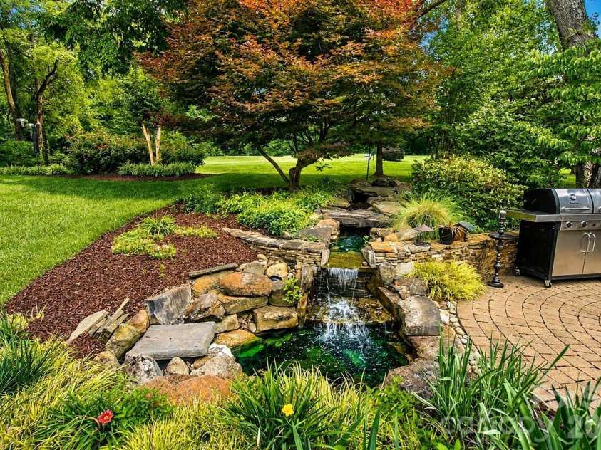 8716 Devonshire Drive, Huntersville, NC 28078.  MLS# CAR4377516, YatesRealty ID 31879. Water feature