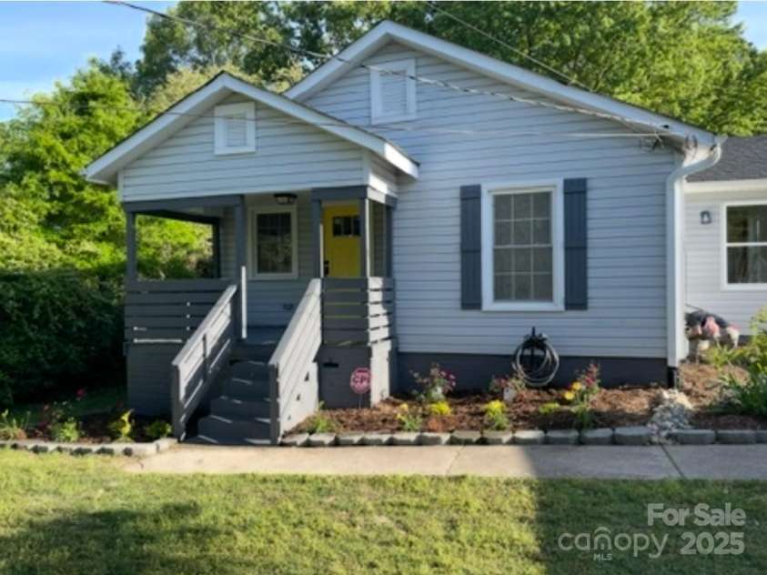 1202 Woodlawn Street, Kannapolis, NC 28083.  MLS# CAR4287261, YatesRealty ID 31881. Brand new modern front porch and landscaping!