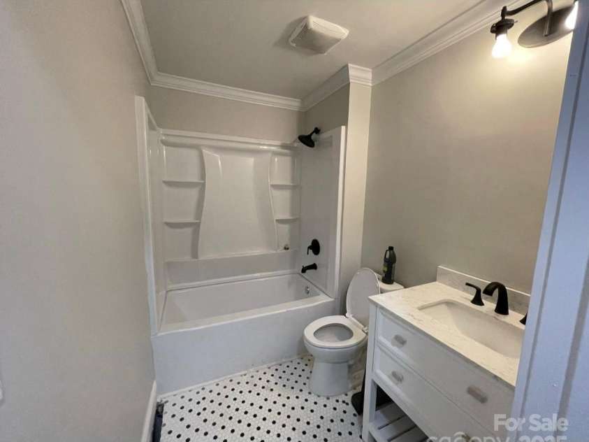 1202 Woodlawn Street, Kannapolis, NC 28083.  MLS# CAR4287261, YatesRealty ID 31881. Completely modern bathroom with new plumbing and fixtures