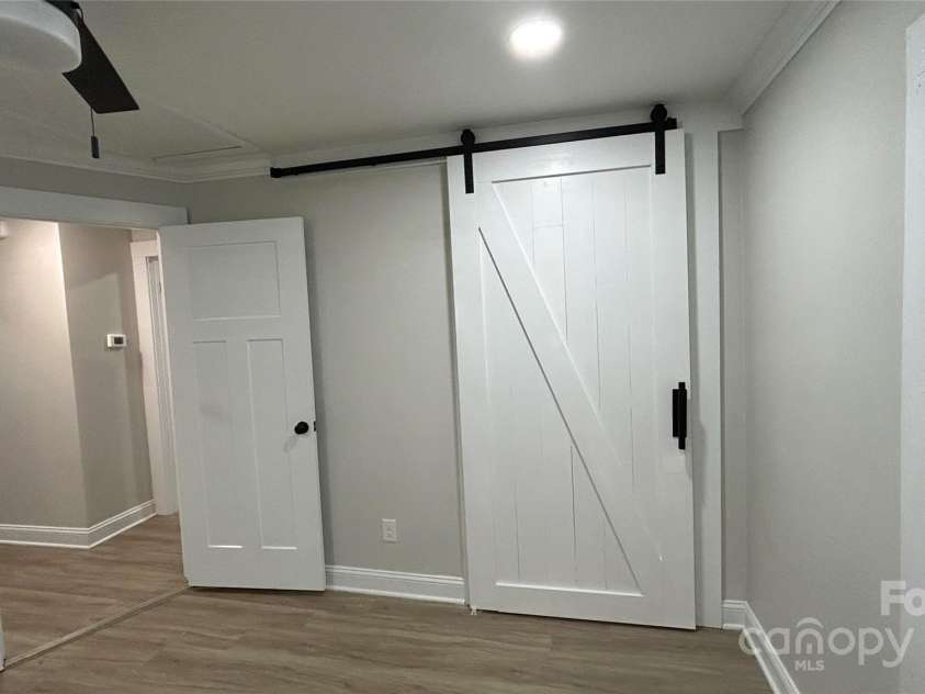 1202 Woodlawn Street, Kannapolis, NC 28083.  MLS# CAR4287261, YatesRealty ID 31881. New barn doors with built-in closet systems