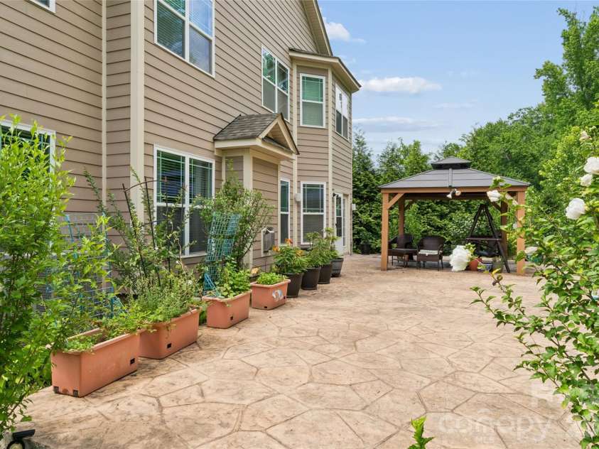 1345 Sandy Bottom Drive, Concord, NC 28027.  MLS# CAR4388399, YatesRealty ID 31881. Backyard