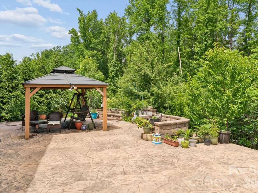 1345 Sandy Bottom Drive, Concord, NC 28027.  MLS# CAR4388399, YatesRealty ID 31881. Backyard