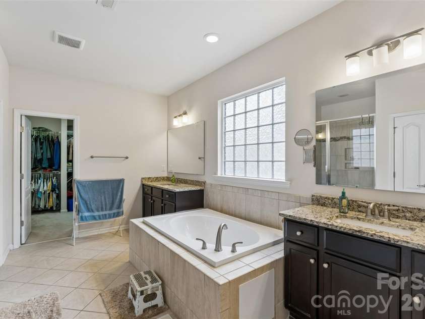 1345 Sandy Bottom Drive, Concord, NC 28027.  MLS# CAR4388399, YatesRealty ID 31881. Master Bath