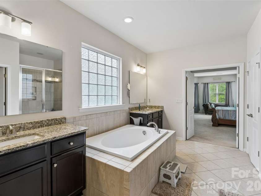 1345 Sandy Bottom Drive, Concord, NC 28027.  MLS# CAR4388399, YatesRealty ID 31881. Master Bath
