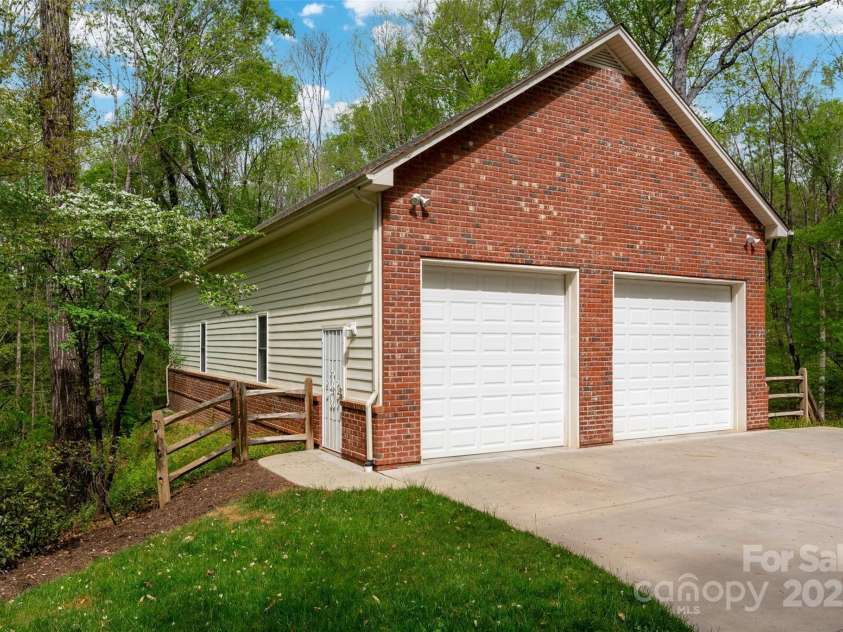 2306 Beechwood Drive, Waxhaw, NC 28173.  MLS# CAR4249221, YatesRealty ID 31885. Custom Garage for car enthusiast, RV, or Boat