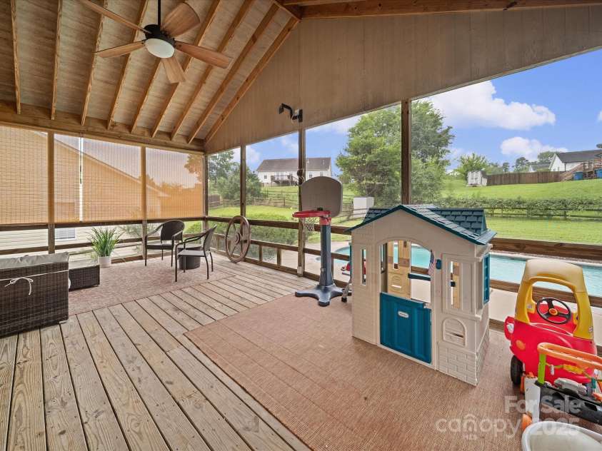 640 Loch Lomond Circle, Concord, NC 28025.  MLS# CAR4290569, YatesRealty ID 31886. Screened Porch