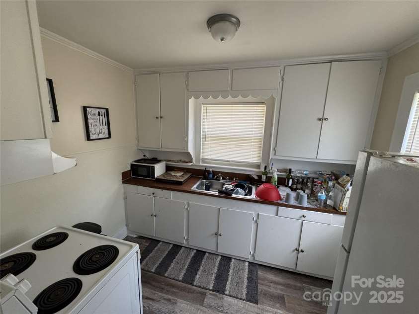 391-399 Kerr Street, Concord, NC 28025.  MLS# CAR4283715, YatesRealty ID 31887. Kitchen