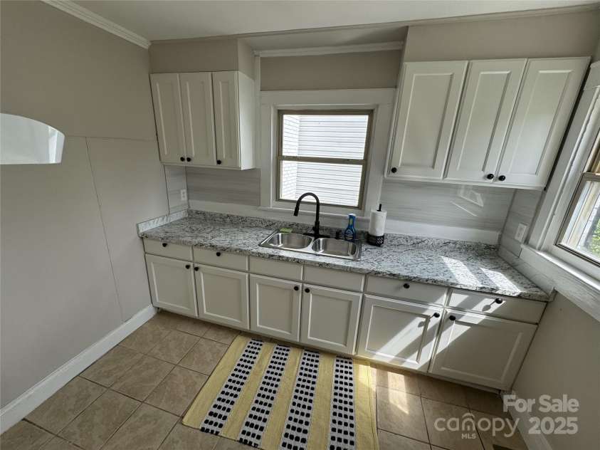 391-399 Kerr Street, Concord, NC 28025.  MLS# CAR4283715, YatesRealty ID 31887. Kitchen