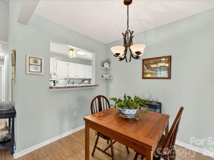 7306 Carrbridge Lane, Charlotte, NC 28226.  MLS# CAR4390862, YatesRealty ID 31888. Dining area can accommodate a  larger table if needed.