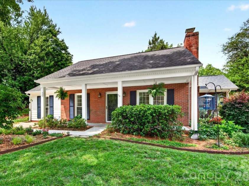 7306 Carrbridge Lane, Charlotte, NC 28226.  MLS# CAR4390862, YatesRealty ID 31888. Large covered rocking-chair front porch!