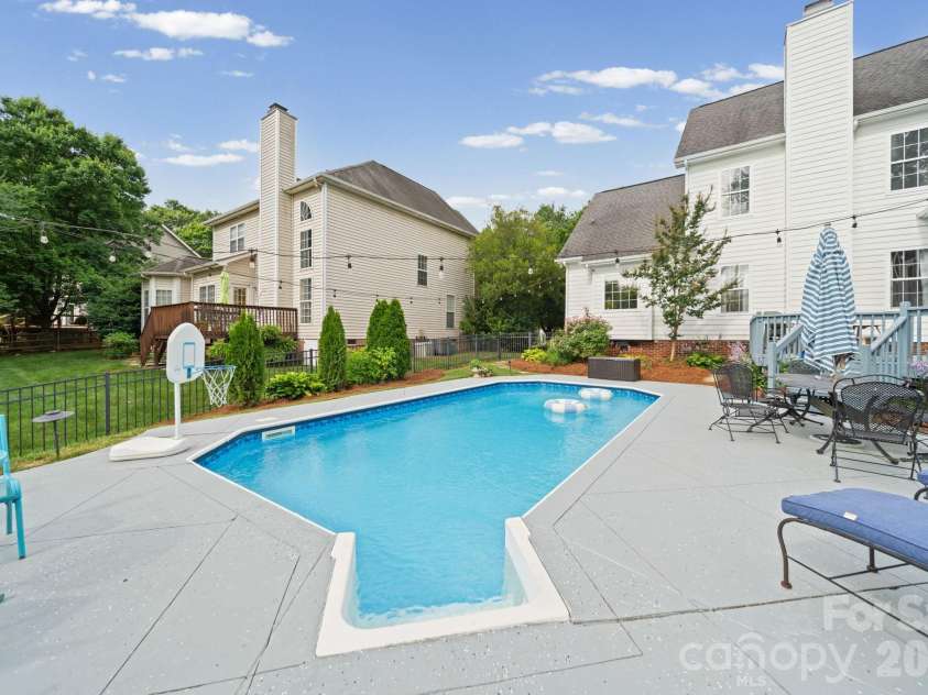 10203 Rougemont Lane, Charlotte, NC 28277.  MLS# CAR4394772, YatesRealty ID 31890. Backyard oasis for summer enjoyment
