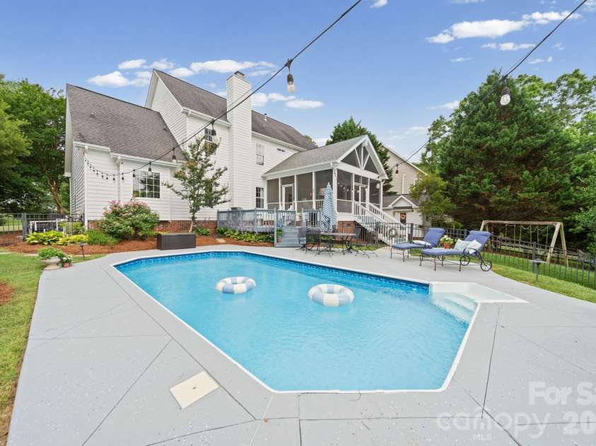 10203 Rougemont Lane, Charlotte, NC 28277.  MLS# CAR4394772, YatesRealty ID 31890. Heated in-ground pool