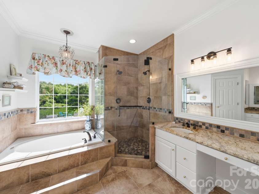 10203 Rougemont Lane, Charlotte, NC 28277.  MLS# CAR4394772, YatesRealty ID 31890. Spa-inspired primary bath
