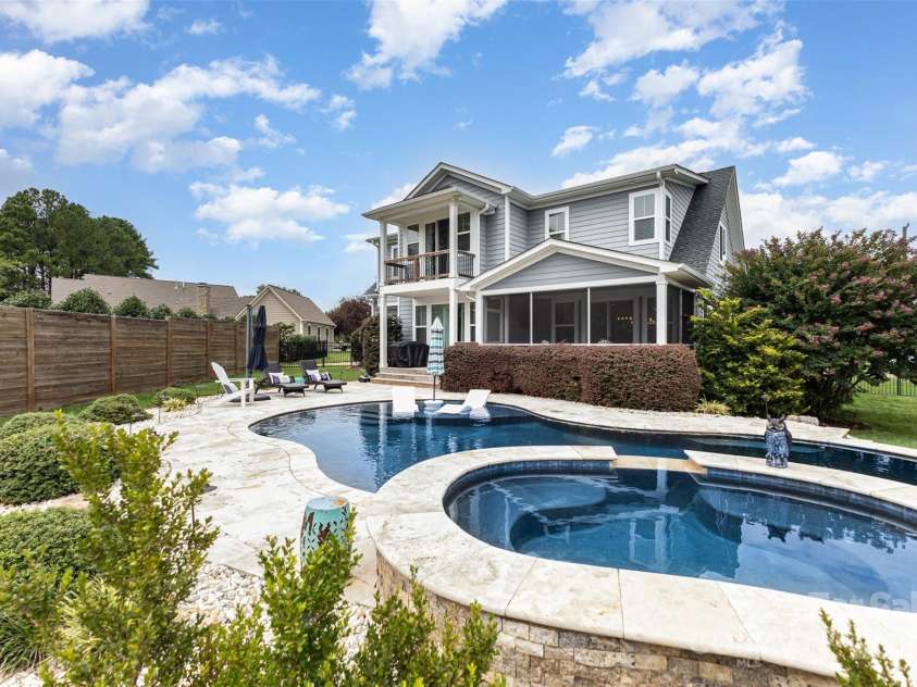 2611 Ranger Island Road, Denver, NC 28037.  MLS# CAR4290507, YatesRealty ID 31894. Backyard angle with landscaping around Pool