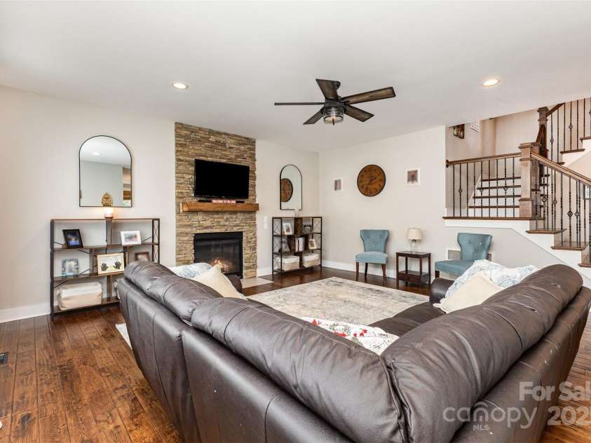 2611 Ranger Island Road, Denver, NC 28037.  MLS# CAR4290507, YatesRealty ID 31894. Family Area showing Stairs and Fireplace