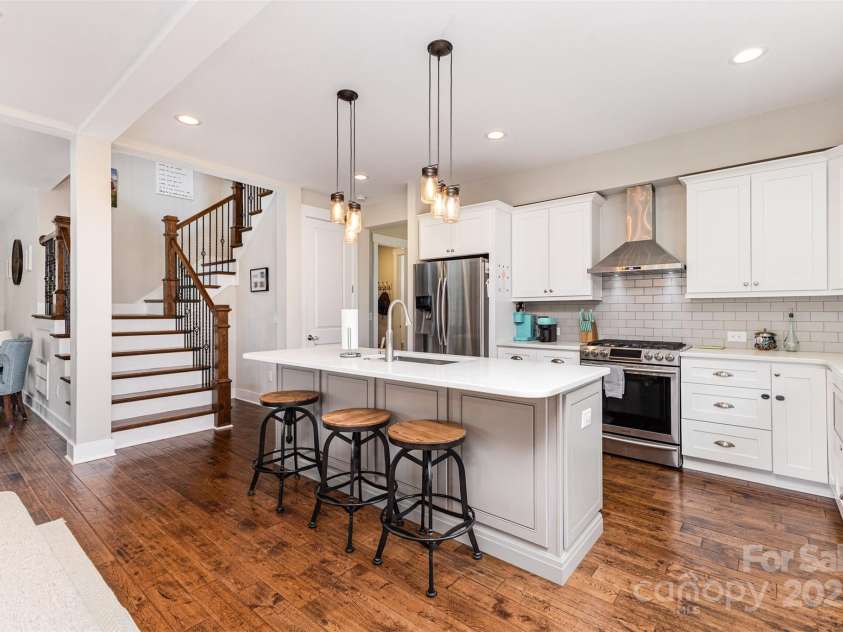 2611 Ranger Island Road, Denver, NC 28037.  MLS# CAR4290507, YatesRealty ID 31894. Open Area Kitchen showing stairs