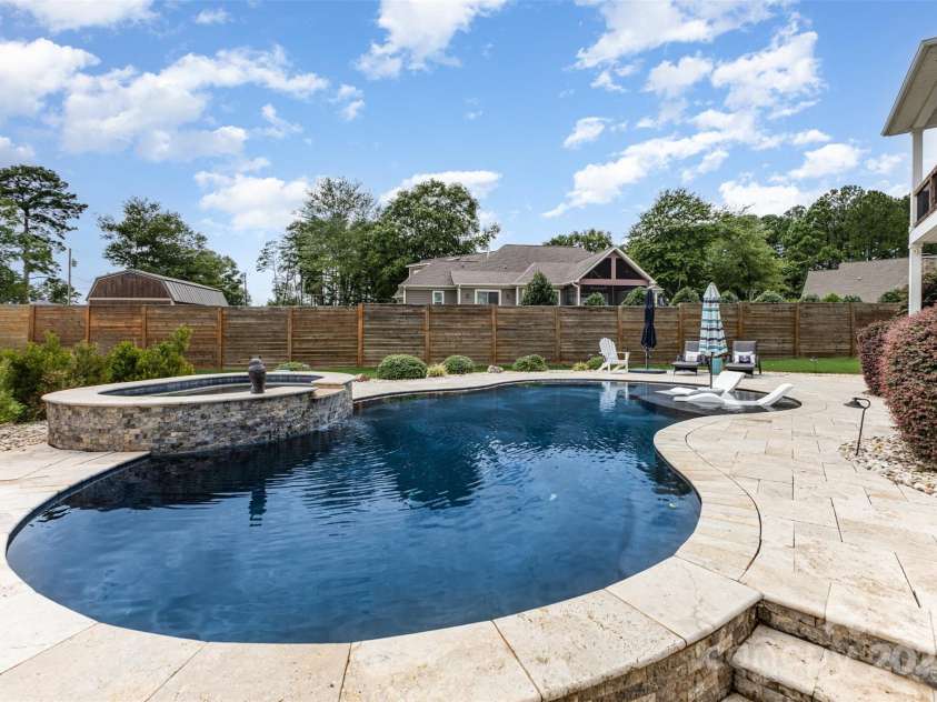 2611 Ranger Island Road, Denver, NC 28037.  MLS# CAR4290507, YatesRealty ID 31894. Privacy Fence beside Pool