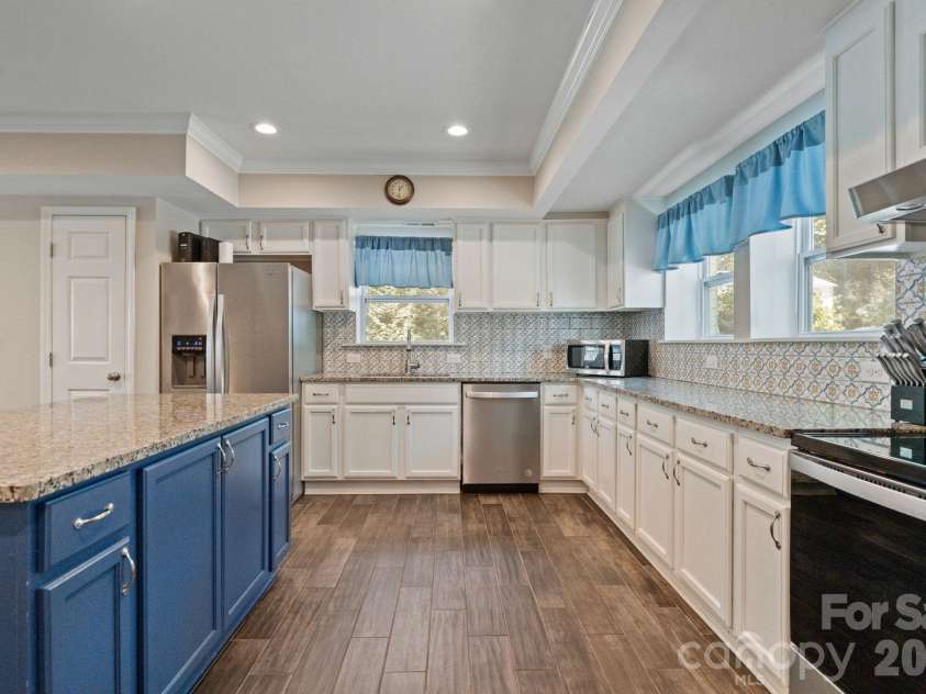 383 Sundown Road, Mooresville, NC 28117.  MLS# CAR4385872, YatesRealty ID 31897. Kitchen designed easy function and flow
