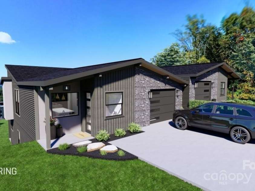 602 Storybook Villas Trail, Asheville, NC 28804.  MLS# CAR4211329, YatesRealty ID 319. Exterior entry with main level garage