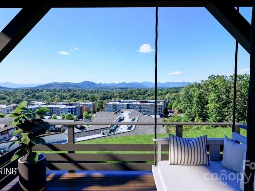 602 Storybook Villas Trail, Asheville, NC 28804.  MLS# CAR4211329, YatesRealty ID 319. Panoramic mountain views from covered deck