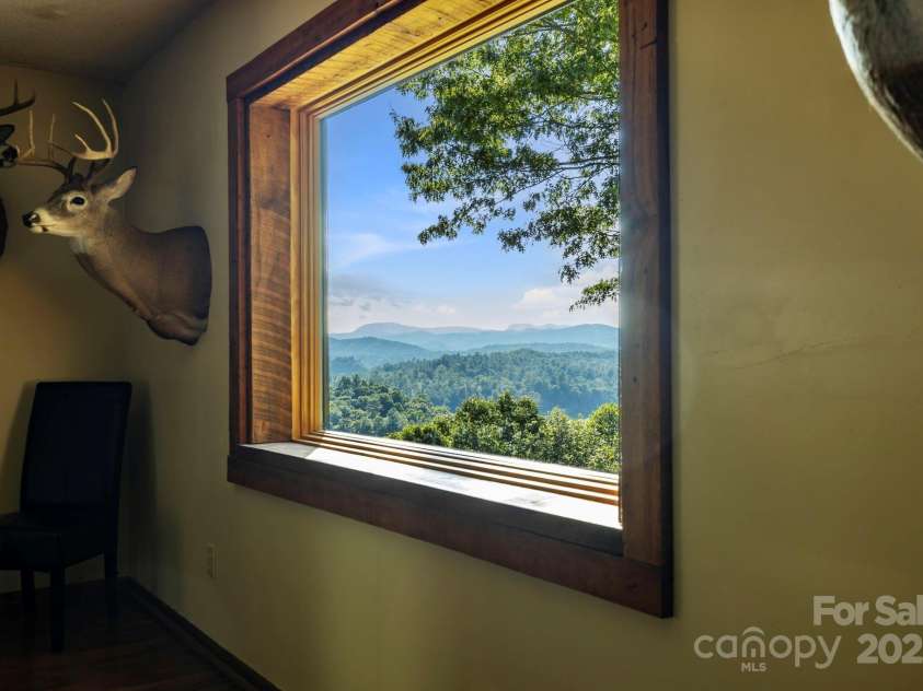 658 Johnson Road, Brevard, NC 28712.  MLS# CAR4300237, YatesRealty ID 319. Incredible views!
