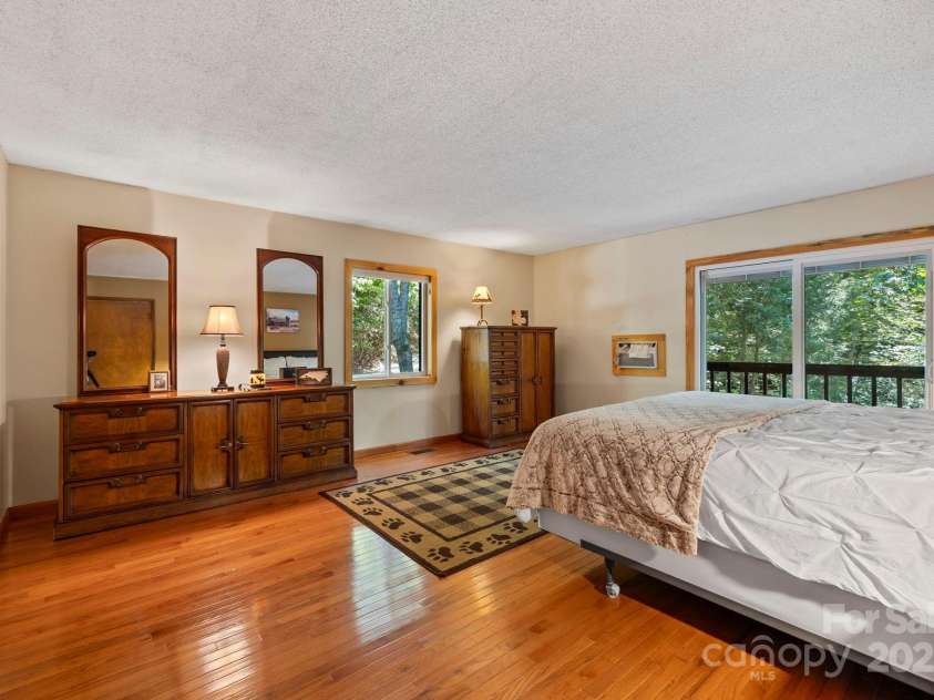 658 Johnson Road, Brevard, NC 28712.  MLS# CAR4300237, YatesRealty ID 319. Massive primary bedroom