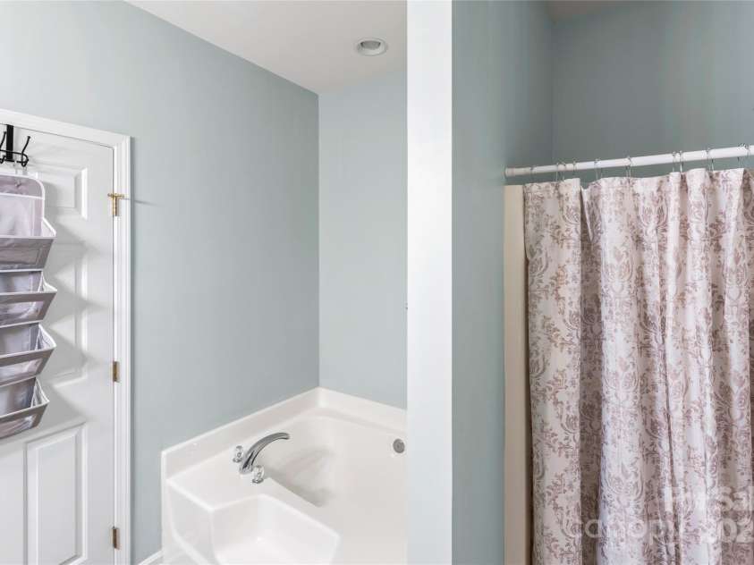 630 Bayou Circle, Clover, SC 29710.  MLS# CAR4284950, YatesRealty ID 31900. Featuring a Garden tub, separate Walk in Shower, rain water shower head the Primary bath offers comfort and style.