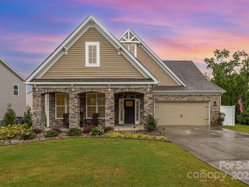 2100 Black Forest Cove, Concord, NC 28027.  MLS# CAR4285883, YatesRealty ID 31901. Front House Twilight