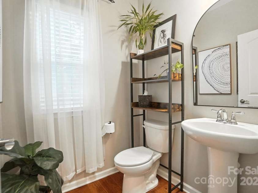 4012 Bainbridge Place, Fort Mill, SC 29707.  MLS# CAR4282310, YatesRealty ID 31905. Downstairs half bath