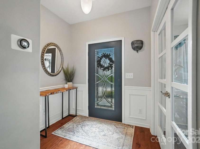4012 Bainbridge Place, Fort Mill, SC 29707.  MLS# CAR4282310, YatesRealty ID 31905. Foyer leading to downstairs Home Office