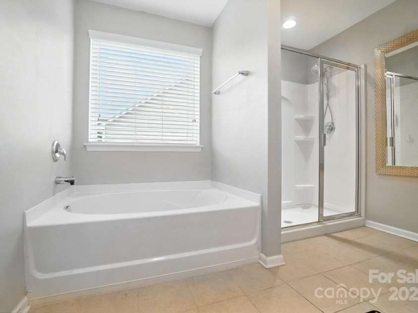 4012 Bainbridge Place, Fort Mill, SC 29707.  MLS# CAR4282310, YatesRealty ID 31905. Primary Bath with Separate Shower