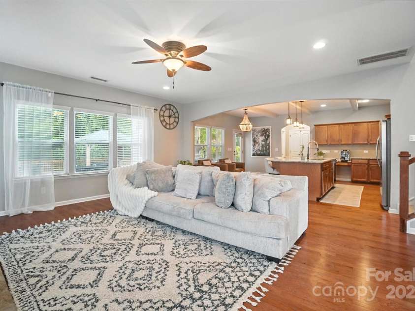 4012 Bainbridge Place, Fort Mill, SC 29707.  MLS# CAR4282310, YatesRealty ID 31905. View of living room from from formal dining