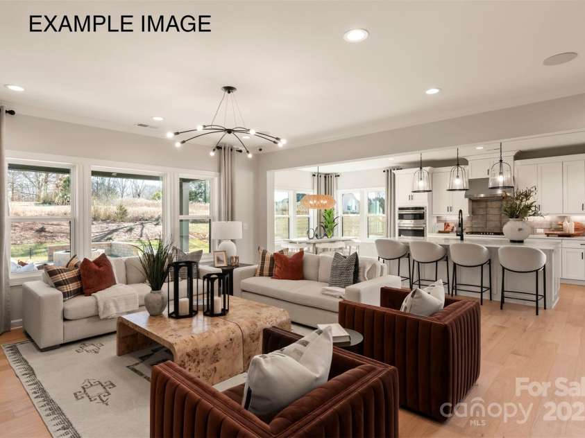 12107 Sessile Drive, Mint Hill, NC 28227.  MLS# CAR4274005, YatesRealty ID 31906. Example Photo - Family Room/Kitchen/Breakfast