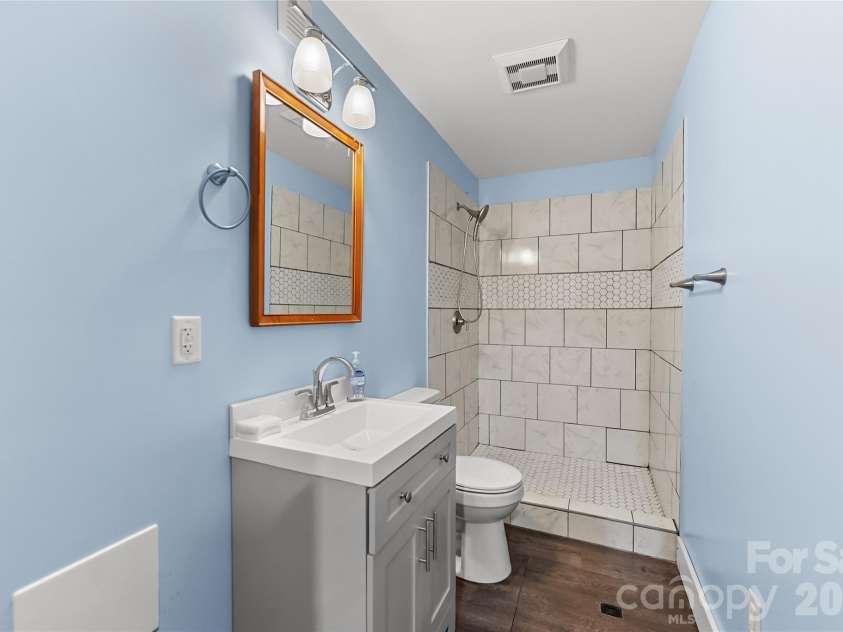 341 Pearson Drive, Asheville, NC 28801.  MLS# CAR4390469, YatesRealty ID 31906. 4th bath in unfinished basement