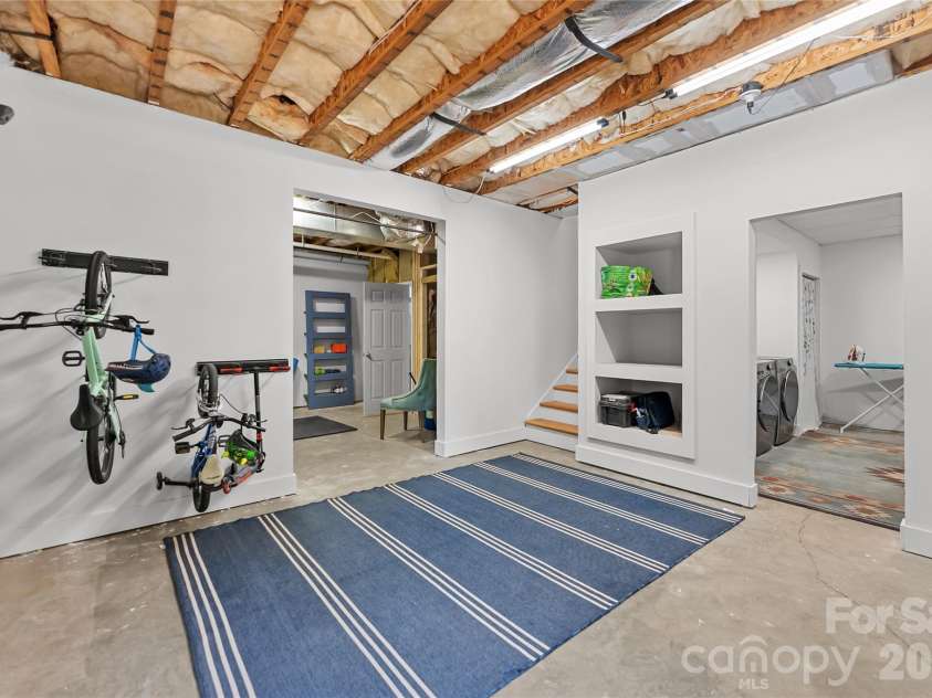 341 Pearson Drive, Asheville, NC 28801.  MLS# CAR4390469, YatesRealty ID 31906. Unfinished basement