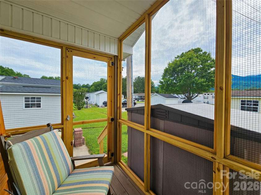 68 Strollers Lane, Waynesville, NC 28786.  MLS# CAR4394372, YatesRealty ID 31907. Back Porch